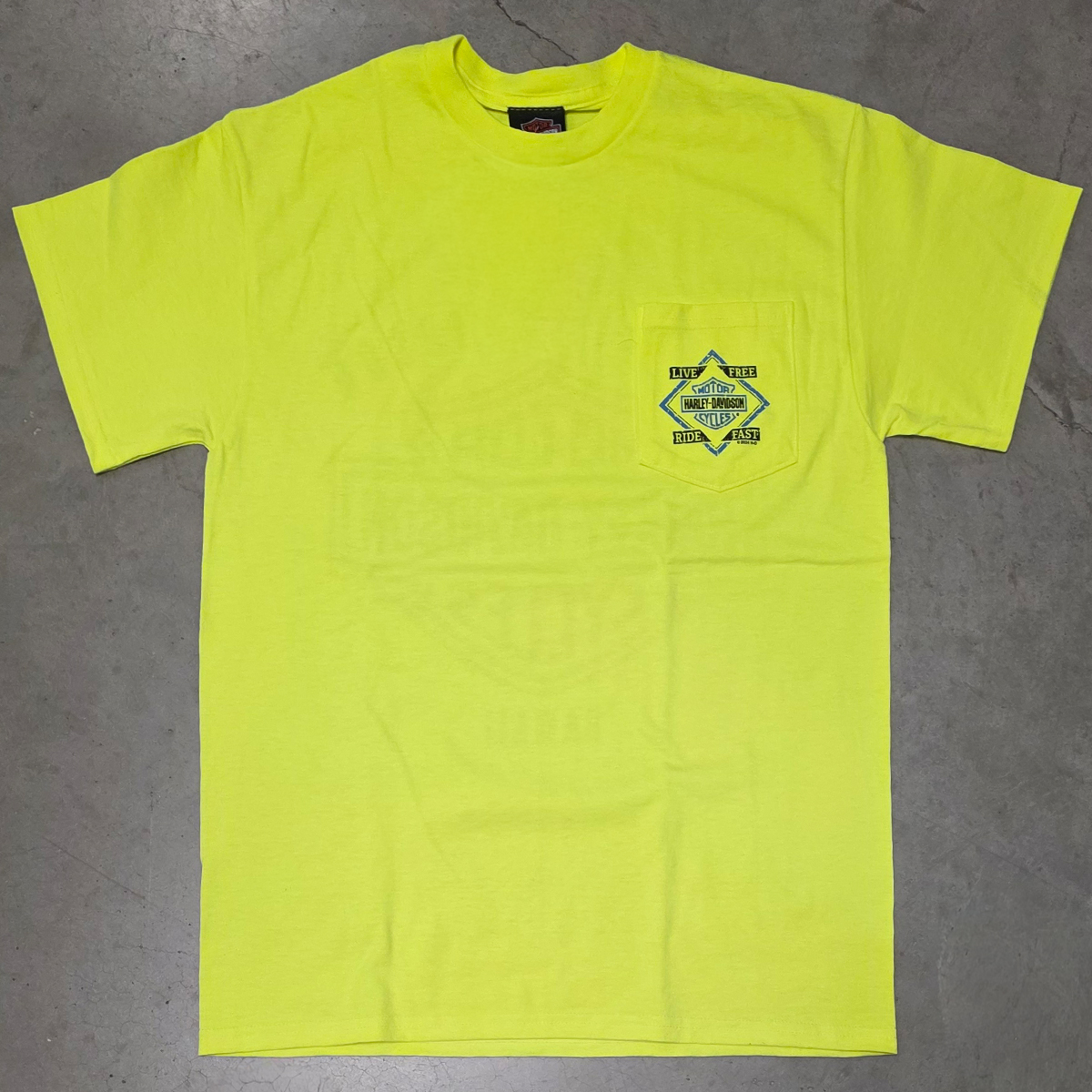 Harley-Davidson Men's Kona Pennant Pocket T-Shirt. 50% Cotton 50% Polyester Safety Green Short Sleeve Pocket Tee. 